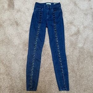 Guess Super High-Rise stretch jegging with crisscross ties on front legs